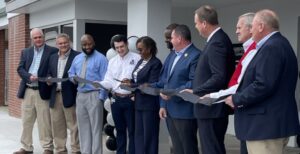 DSS Director for Cherokee County Monita Dawkins cuts the ribbon to dedicate the new $2.8 million building at 113 W. Buford St. in Gaffney. (Photo/The Palladian Group)